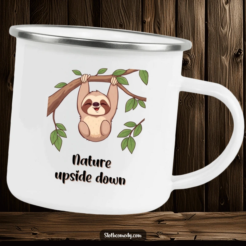 Funny camping mug featuring a sloth giggling while hanging upside down from a branch, ideal for humorous outdoor adventures.